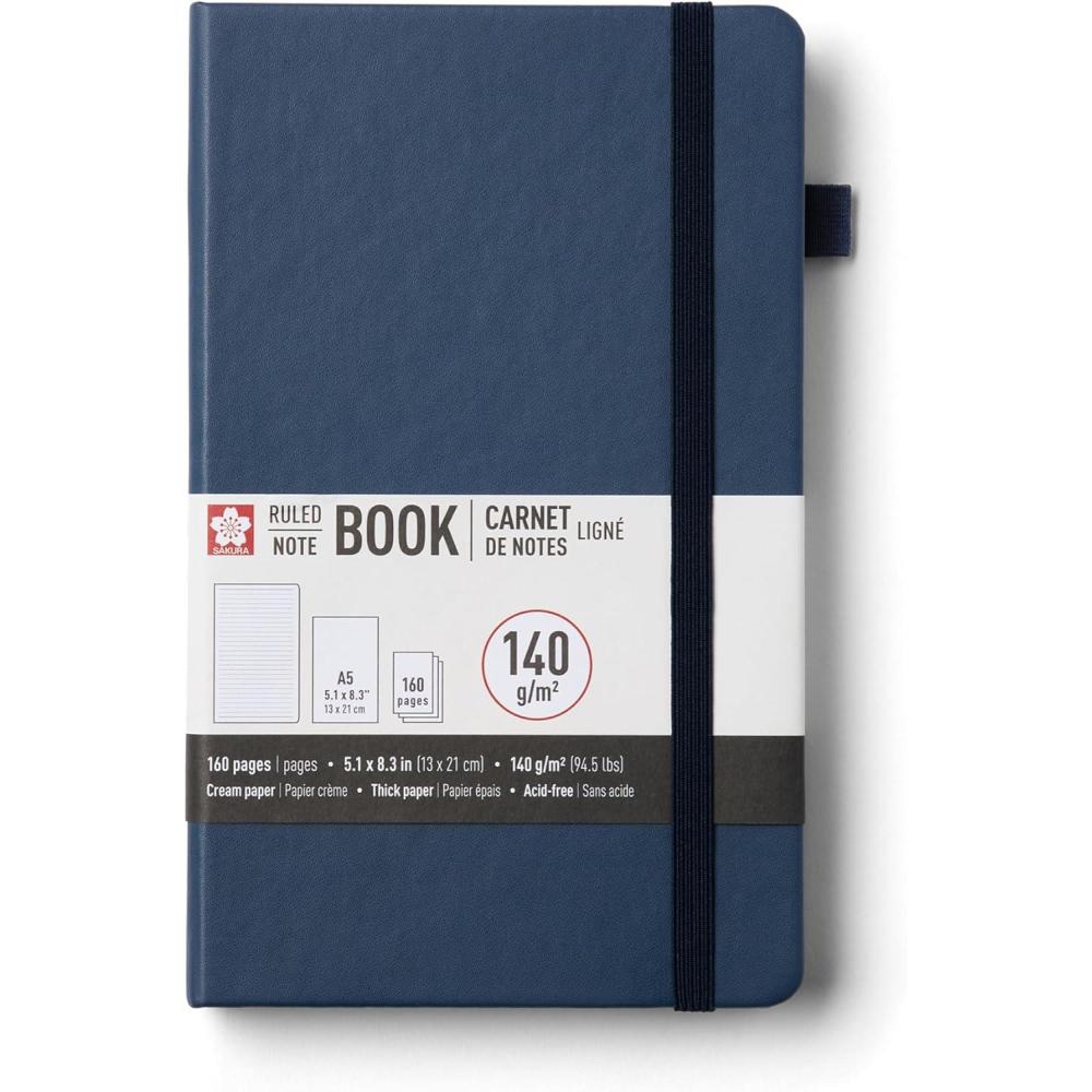 image:imageSakura Notebook Ruled A5 JapaneseInspired Lined Notebook for Effortless Writing 140 GSM Paper Hardcover Builtin Pen Holder Expandable Inner Pocket FlatLay 51 x 83 CinderDeep Indigo